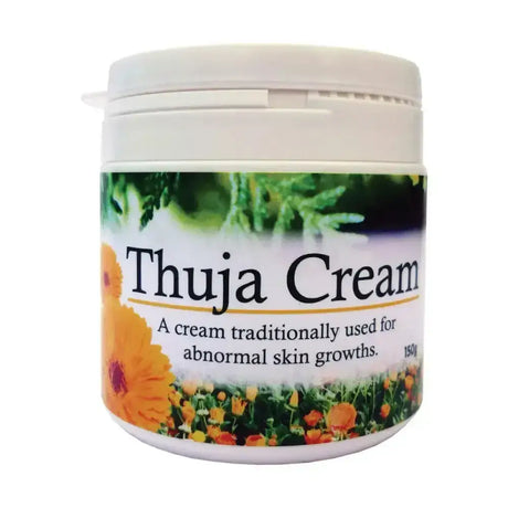 White plastic jar of thuja cream with green foliage and orange flowers labeled soothing herbal cream for skin growths 150g
