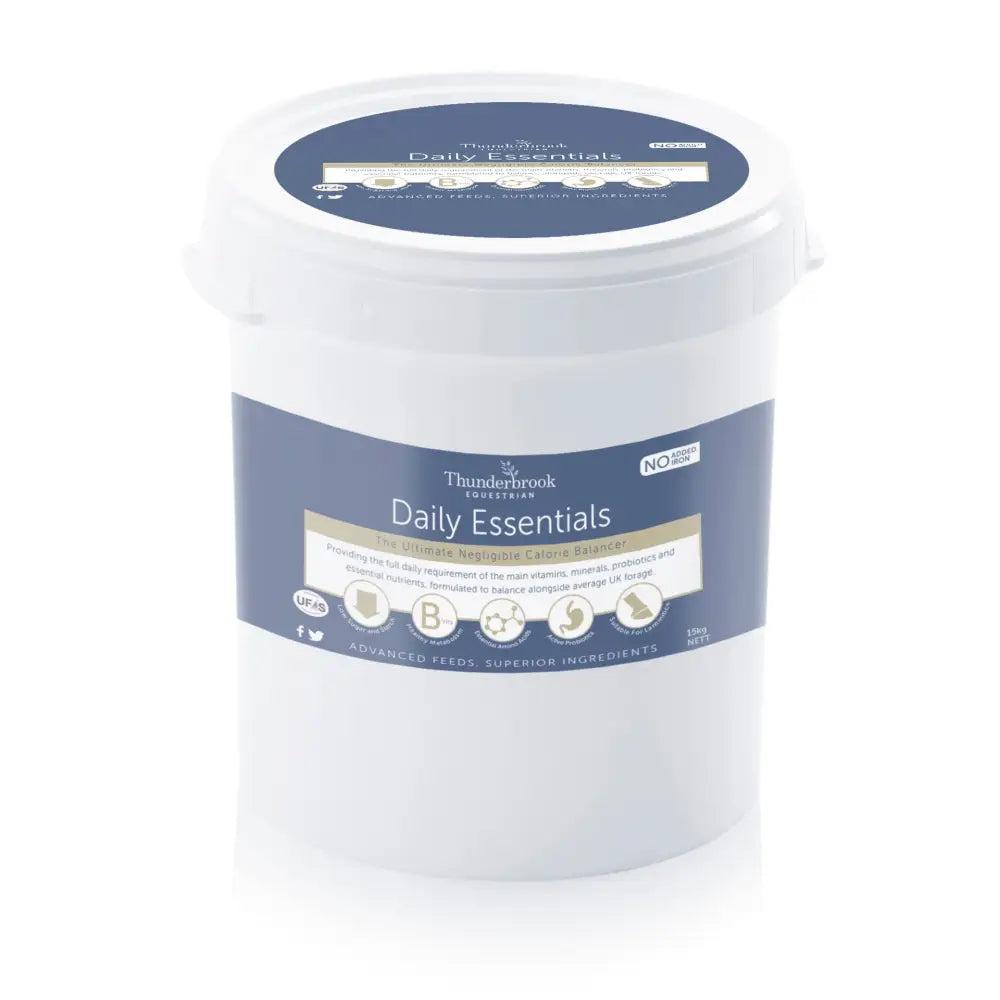 White plastic tub of thunderbrook daily essentials horse feed with blue and beige label for ultimate daily equestrian use