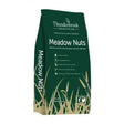 Dark green bag of thunderbrook organic meadow nuts horse feed with gold grass design and white text on front