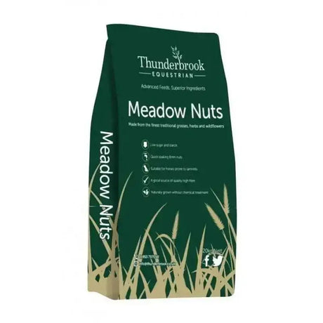 Dark green bag of thunderbrook organic meadow nuts horse feed with gold grass design and white text on front