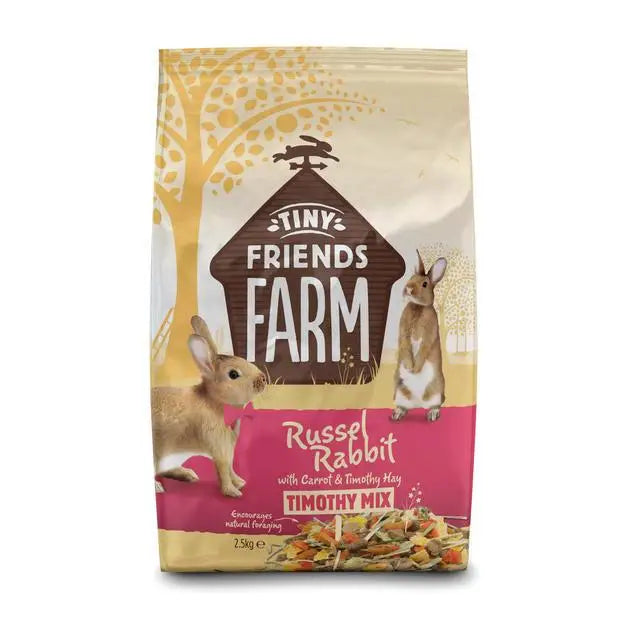 A 2.5kg beige and pink bag of tiny friends farm russel timothy mix rabbit food with rabbit and hay illustrations