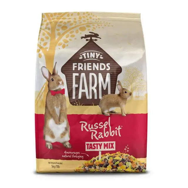 A 5kg bag of tiny friends farm russels tasty mix with beige and red design featuring rabbits on the front