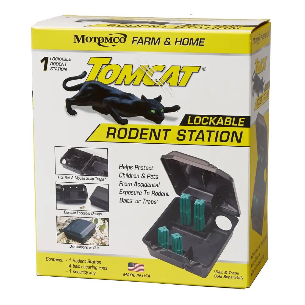 Black plastic tomcat lockable rodent station with green bait holders and tamper-resistant bait stations design