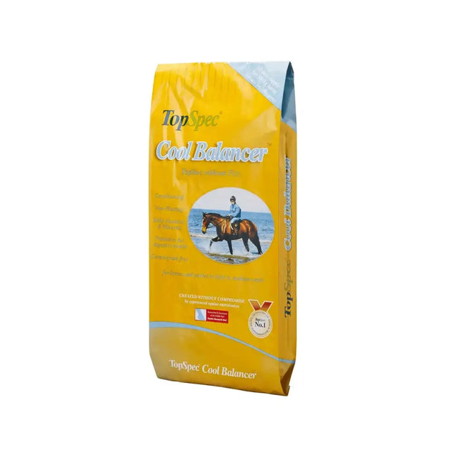 Yellow bag of topspec cool balancer horse feed with a rider on a brown horse for balancer horse feed needs