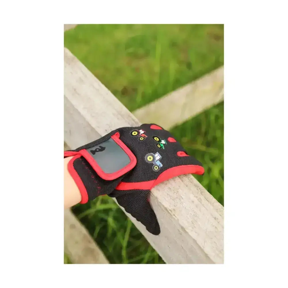 Black and red tractor collection gloves by Little Knight with colorful tractor appliqués on the back and amara grip palms