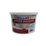 A white plastic tub of triamvet copper sulphate with red and blue labeling for animal footbaths using copper sulphate
