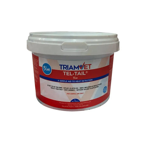 Red and white labeled plastic bucket of triamvet tel-tail paint used as a veterinary heat detection aid for mounting activities