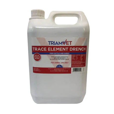 White plastic jug with handle and cap labeled triamvet trace element drench to prevent nutritional deficiency in cattle and sheep