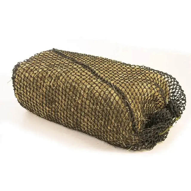 Rolled-up olive green trickle net small bale haynets made of mesh netting filled with hay for feeding small bales
