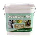 A white plastic bucket with a teal and green label of trm good as gold plus mag horse supplements for complementary feeding stuff
