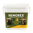 White plastic bucket with green and yellow label for trm hemorex horse supplements to support lung function