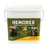 White plastic bucket with green and yellow label for trm hemorex horse supplements to support lung function