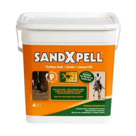 White plastic bucket of trm sandxpell horse feed supplement with orange and green label featuring psyllium husk for horses grazing