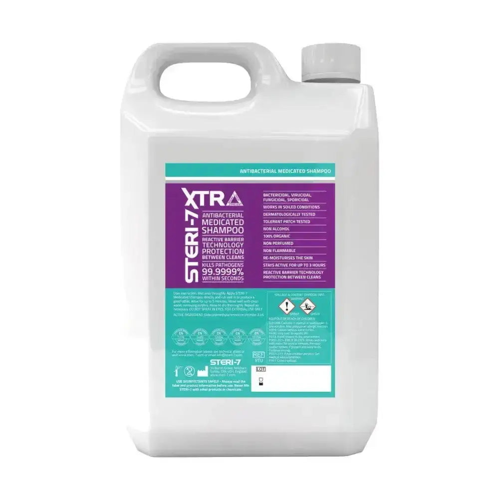White plastic jug with gray cap and purple teal label of trm steri 7 extra antibacterial medicated shampoo