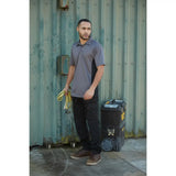 Gray and black two-tone polo shirt with collar and short sleeves paired with tuffstuff proflex work trouser black xlong