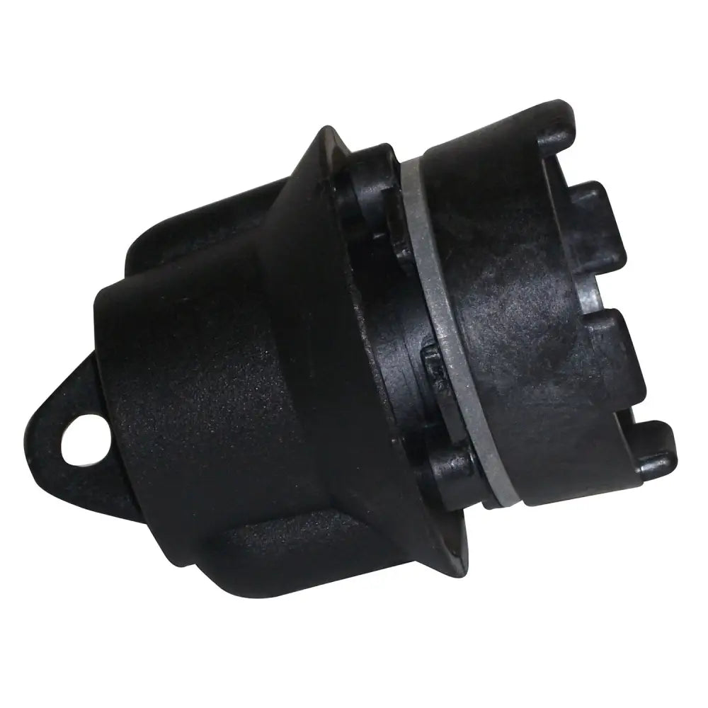 Turnock lamp holder made of black high temperature plastic with gray rubber seal and molded tabs for secure fit