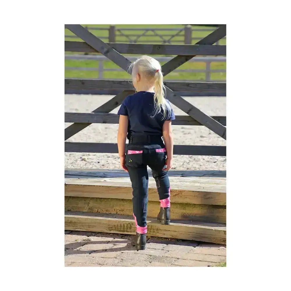 Black riding pants with pink pocket and cuff accents from little rider unicorn magic breeches collection