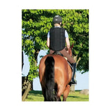 Black usg flexi panel body protector with a small white logo on the front designed for equestrian safety