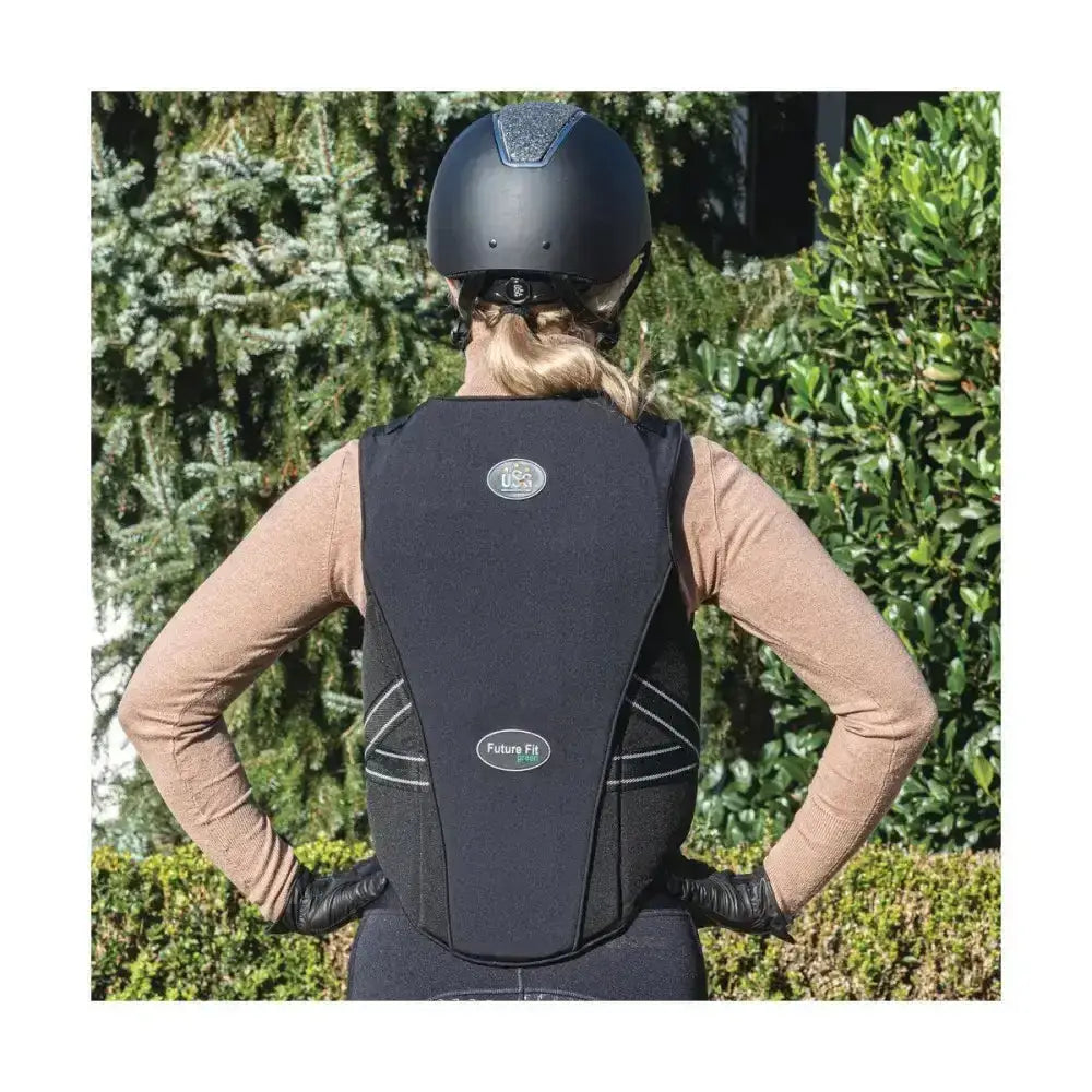 Back side of black usg precto future fit equestrian safety vest with white reflective stripes and logo patch
