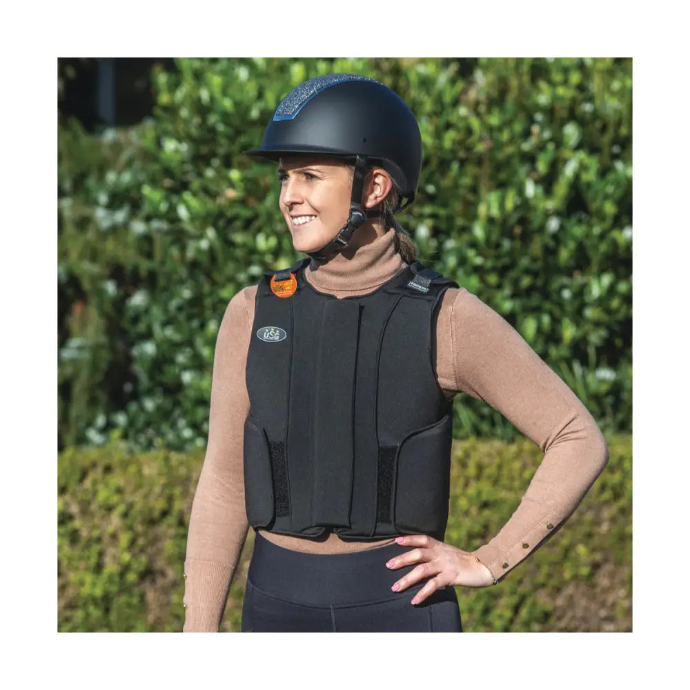 Black usg precto future fit equestrian safety vest with padded panels and adjustable straps for protection