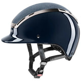 Navy blue uvex exxeed blaze riding hat with glittery gray top silver trim and black adjustable straps extremely impact resistant