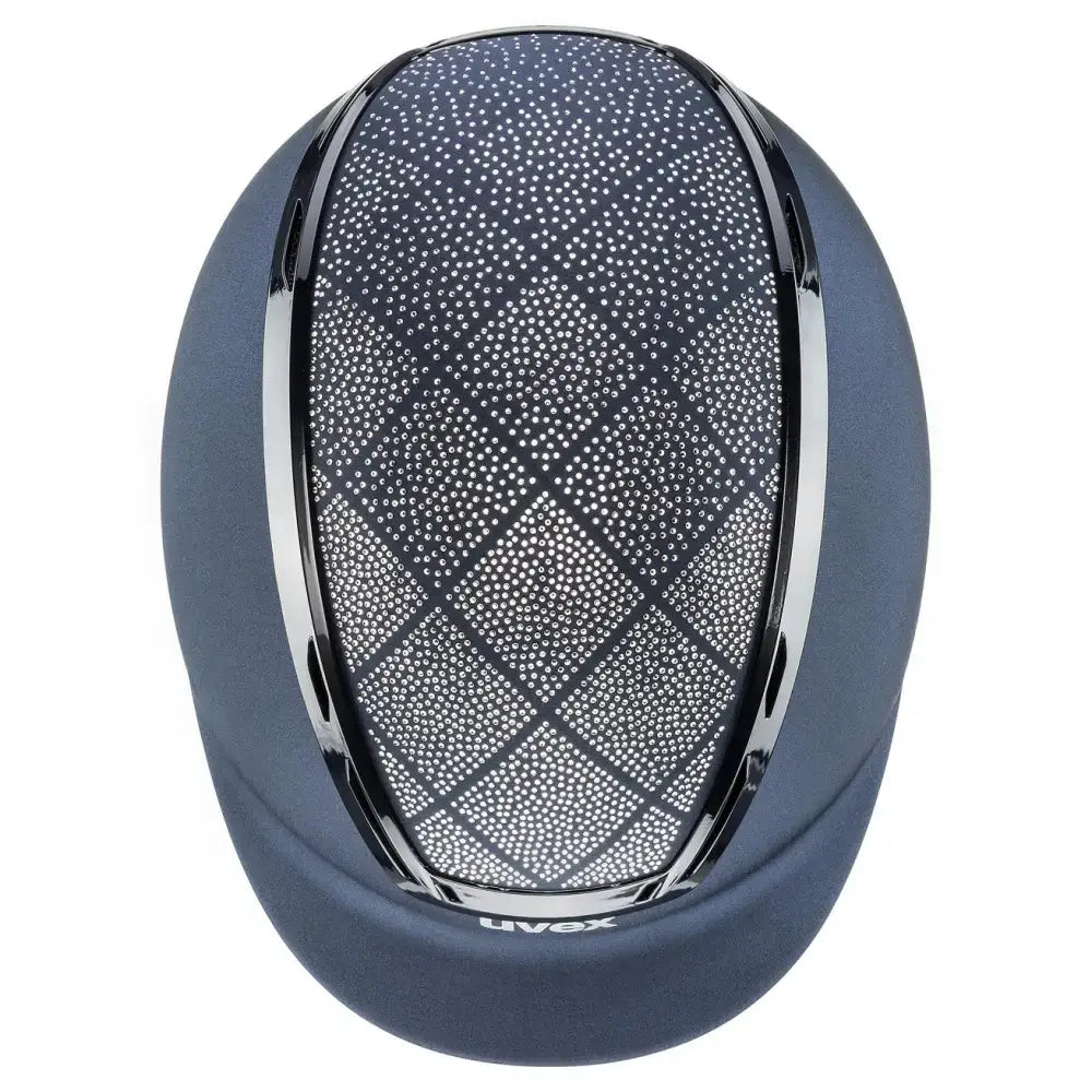 Dark blue uvex exxeed flash riding hat with silver perforated ventilation and chrome trim made with vegan leather