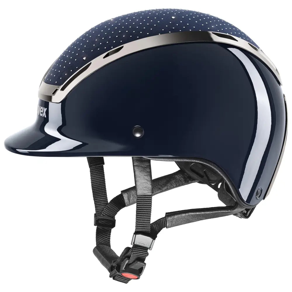 Navy blue uvex exxeed glow riding hat with silver accents and dotted pattern featuring uvex 3d ias and swarovski crystals