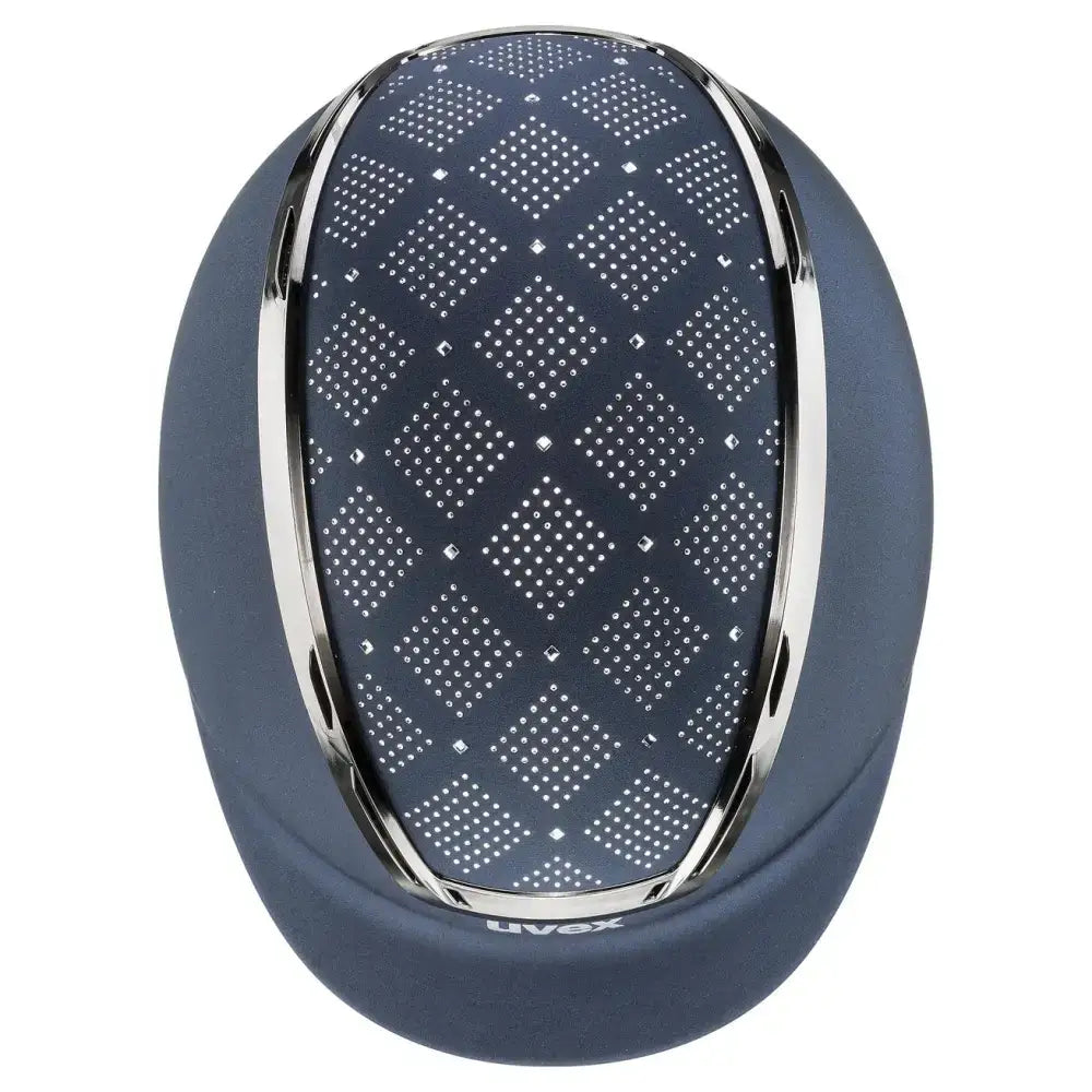 Dark blue uvex exxeed jewel riding hat with diamond-patterned silver perforations and polished chrome trim with vegan leather straps
