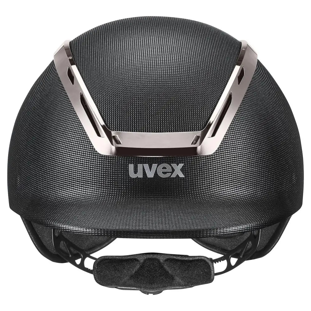 Black uvex exxeed pro riding hat with textured carbon fiber finish silver metallic accents vegan leather straps chrome frame