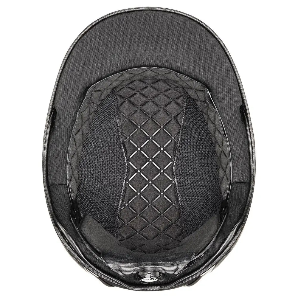 Black uvex exxeed pro riding hat with quilted padding, mesh lining, vegan leather straps, and chrome frame details