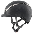 Uvex exxeed pro riding hat with black textured vegan leather straps and a sleek chrome frame accent stripe