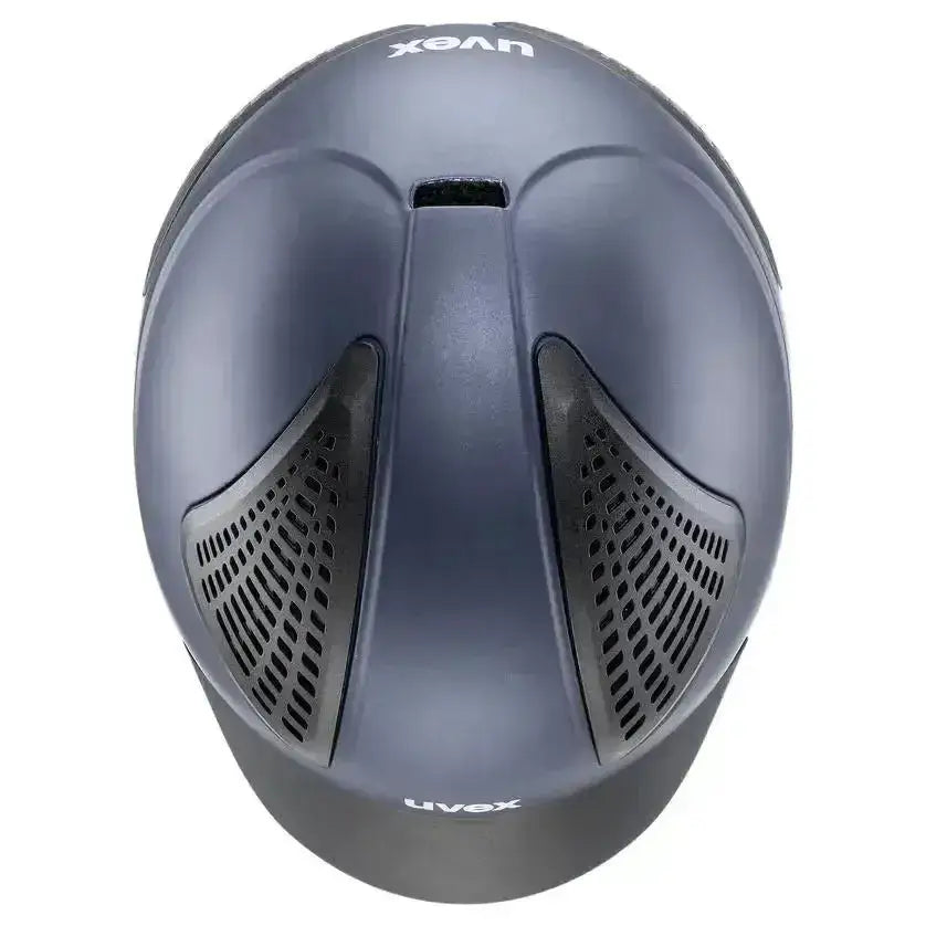 Matte black uvex exxential iii mips adjustable riding helmet with sleek aerodynamic design and side ventilation grilles