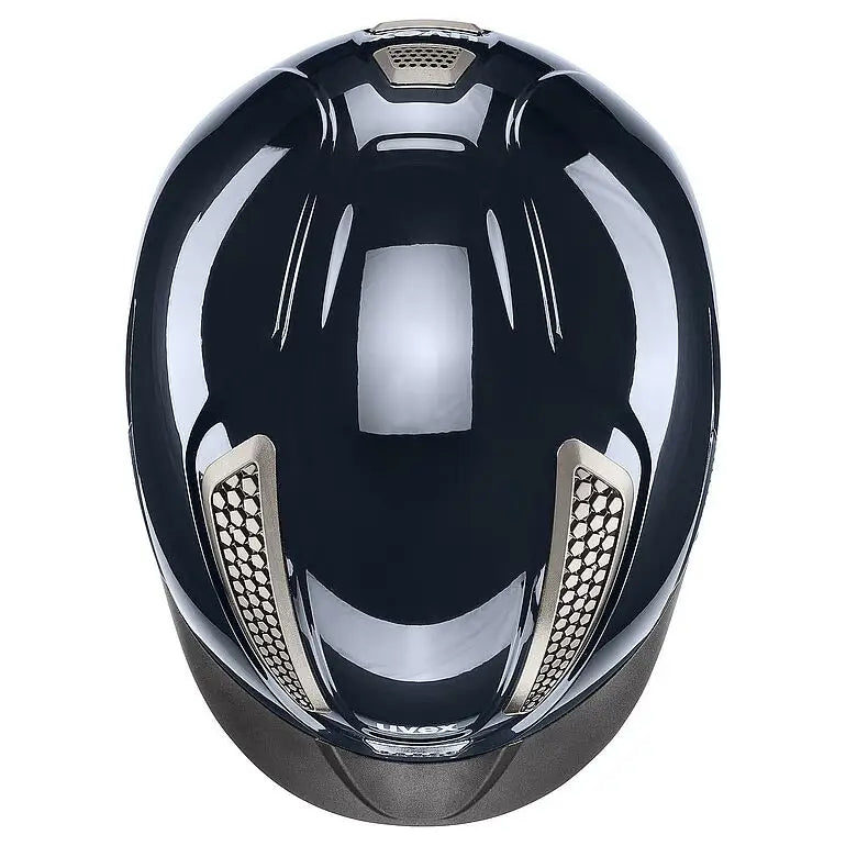 Black glossy uvex perfexxion iii adjustable riding helmet with silver ventilation grilles and aerodynamic design