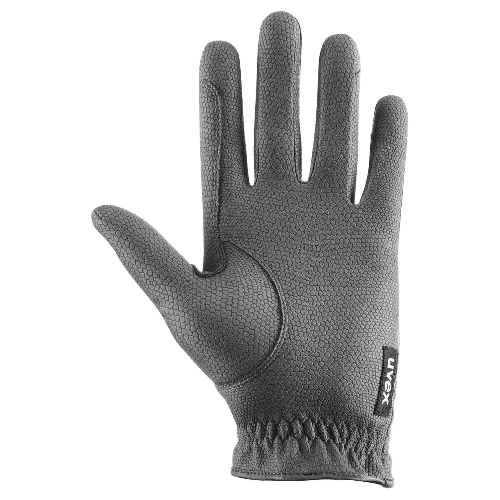 Dark gray textured leather uvex sportstyle riding gloves with excellent grip and black brand tag on the back wrist