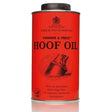 Red cylindrical can of carr & day & martin vanner and prest hoof oil with black lid and vintage horse hoof illustration in infamous red tin