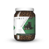 A clear plastic jar of verm-x original crunchies for dogs with natural active ingredients to control intestinal hygiene