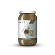 A clear plastic jar with white lid filled with brown verm-x original pellets for sheep and goats controls intestinal hygiene