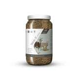 A clear plastic jar with white lid filled with brown verm-x original pellets for sheep and goats controls intestinal hygiene