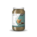 A clear plastic jar with a white lid contains brown verm-x poultry zest pellets for poultry supplements and round condition