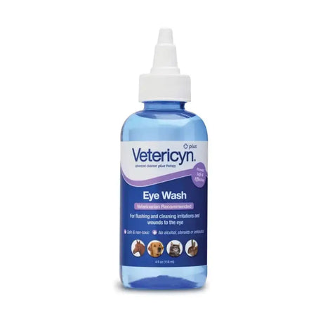 Blue plastic bottle of vetericyn eye wash with white spray nozzle to alleviate irritation as pet eye drops