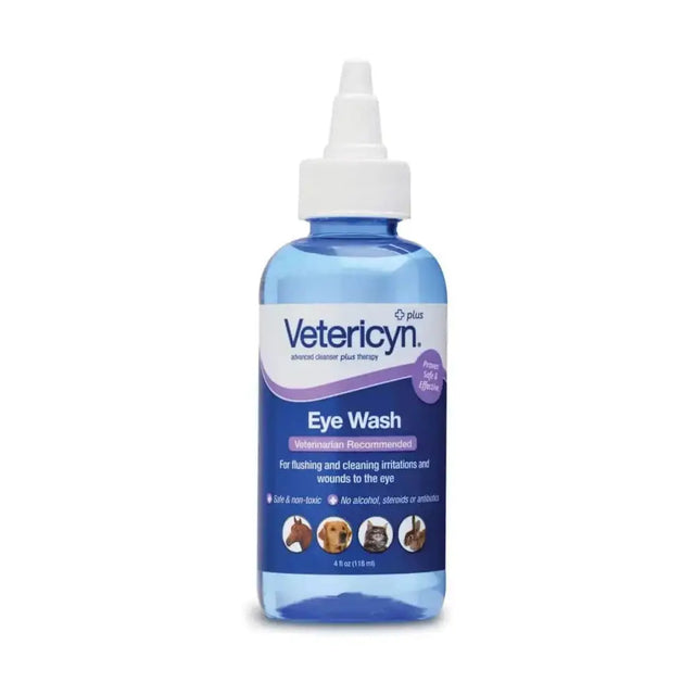 Blue plastic bottle of vetericyn eye wash with white spray nozzle to alleviate irritation as pet eye drops