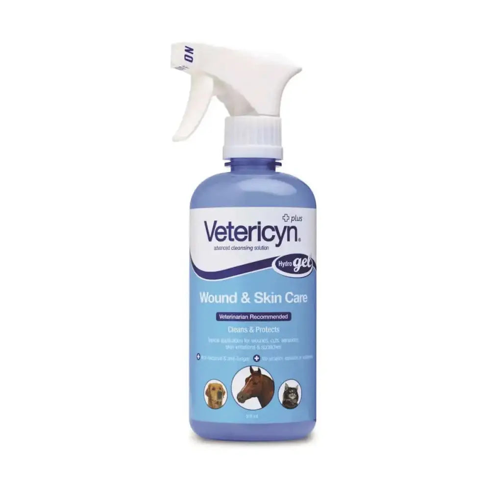 Blue plastic spray bottle with white trigger labeled vetericyn wound skin care hydrogel care hydrogel spray for vets