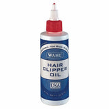 Wahl clipper oil in a white plastic bottle with red cap and blue label for smooth clipper performance 113 ml