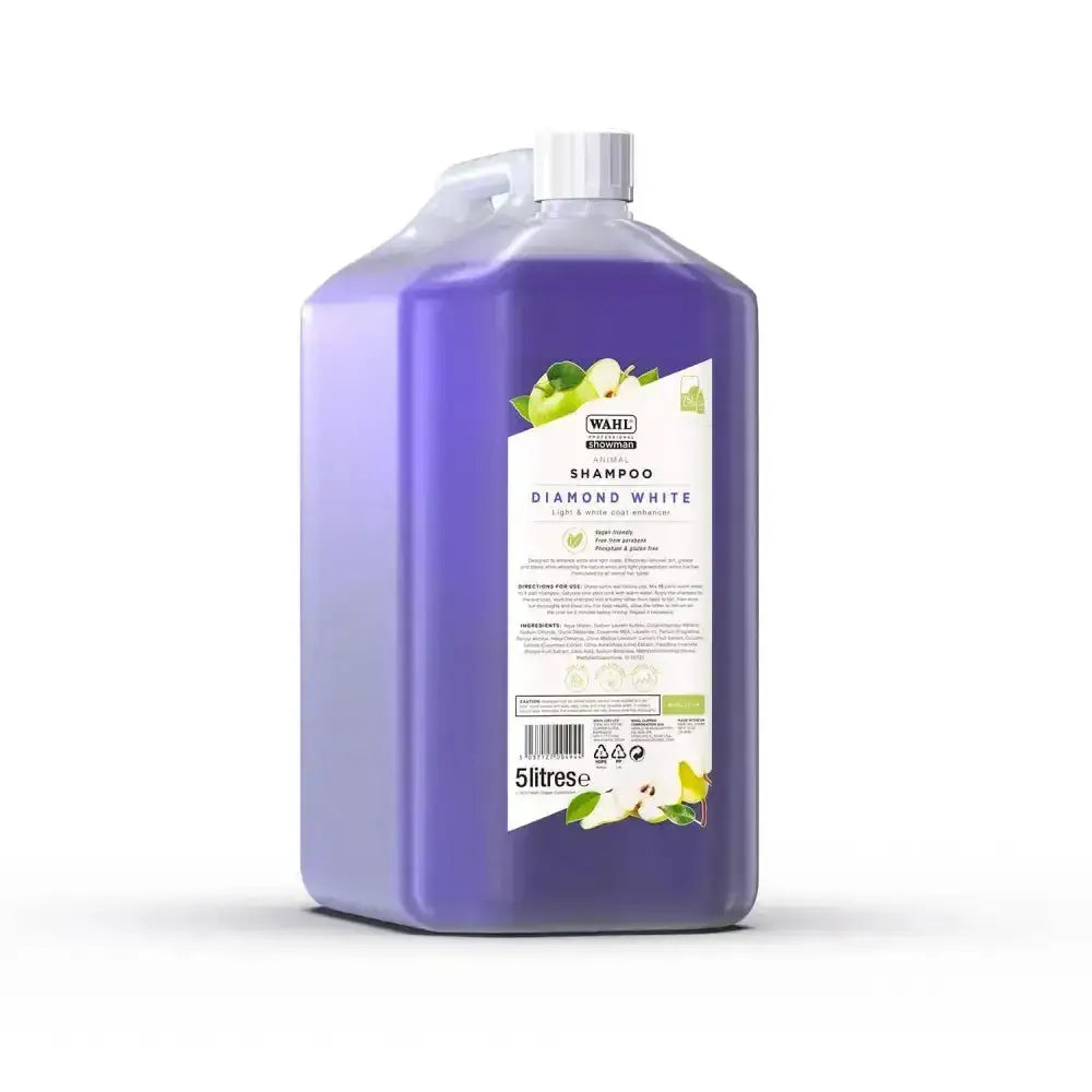 Purple plastic bottle of wahl diamond white shampoo 5 litre with white cap and green apple label perfect balanced formula