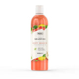 A transparent bottle of wahl dirty beastie shampoo with vibrant orange liquid and a perfectly balanced formula