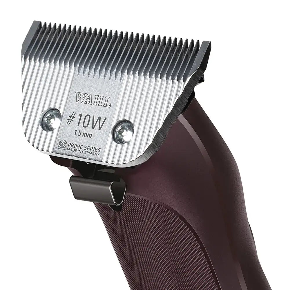 A sleek dark brown wahl km supera equine clipper with a silver 10w 1.5 mm comb attachment and engraved branding