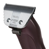 A sleek dark brown wahl km supera equine clipper with a silver 10w 1.5 mm comb attachment and engraved branding