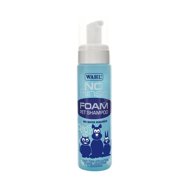 Light blue cylindrical bottle of wahl no rinse shampoo for dogs with white pump and cartoon animal for lustrous coat