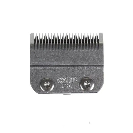Gray metal wahl pro series clipper blade with fine teeth from the medium blade set for precise haircuts