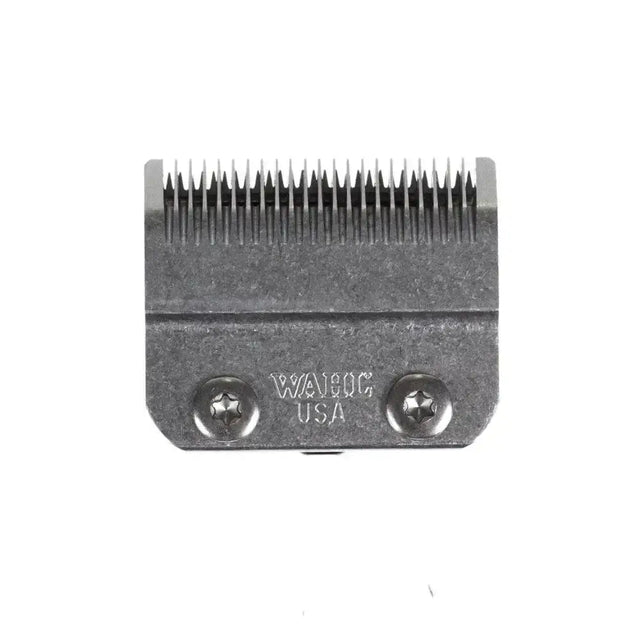 Gray metal wahl pro series clipper blade with fine teeth from the medium blade set for precise haircuts